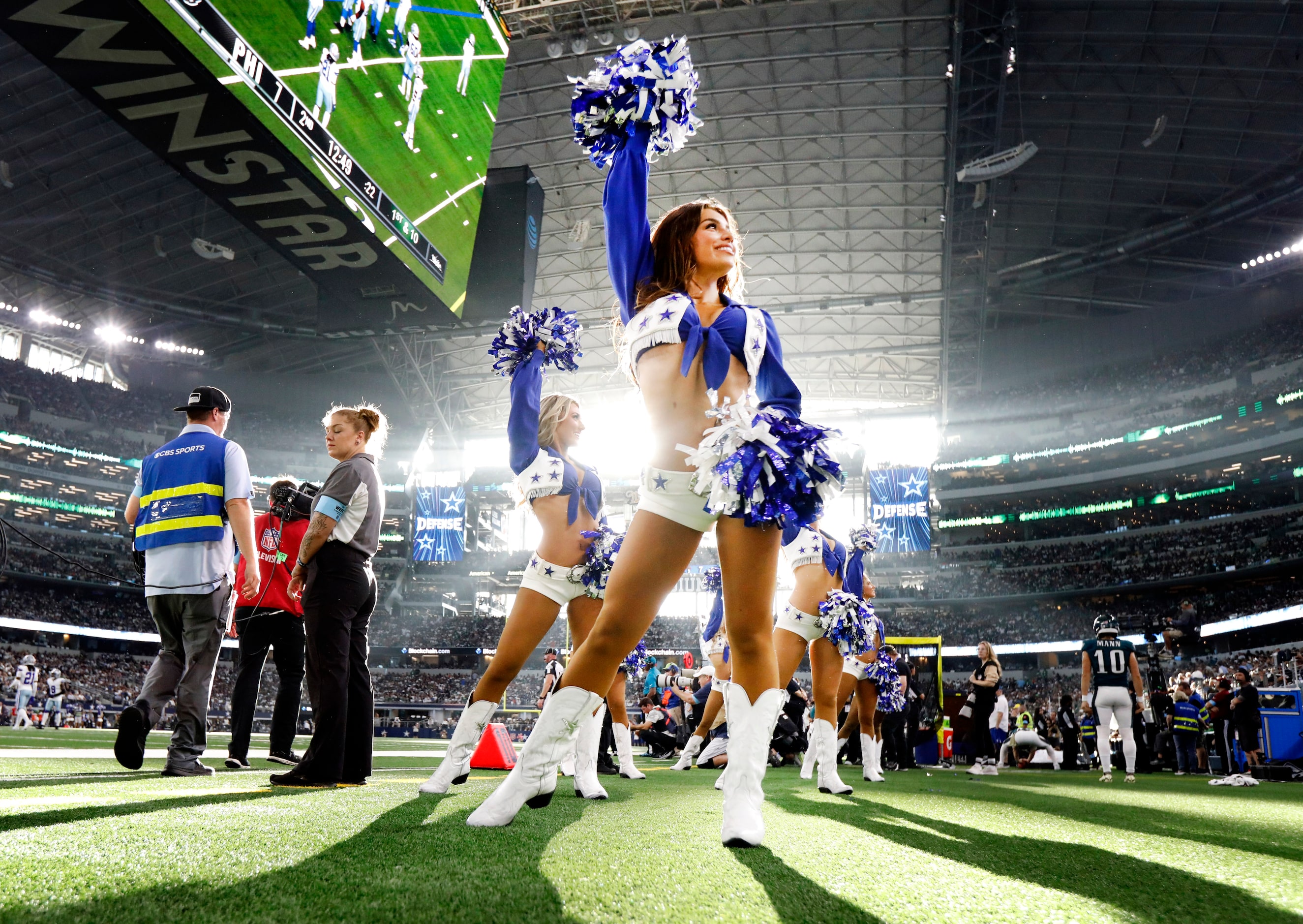 The Dallas Cowboys Cheerleaders dance on the sideline during a first half timeout of the...