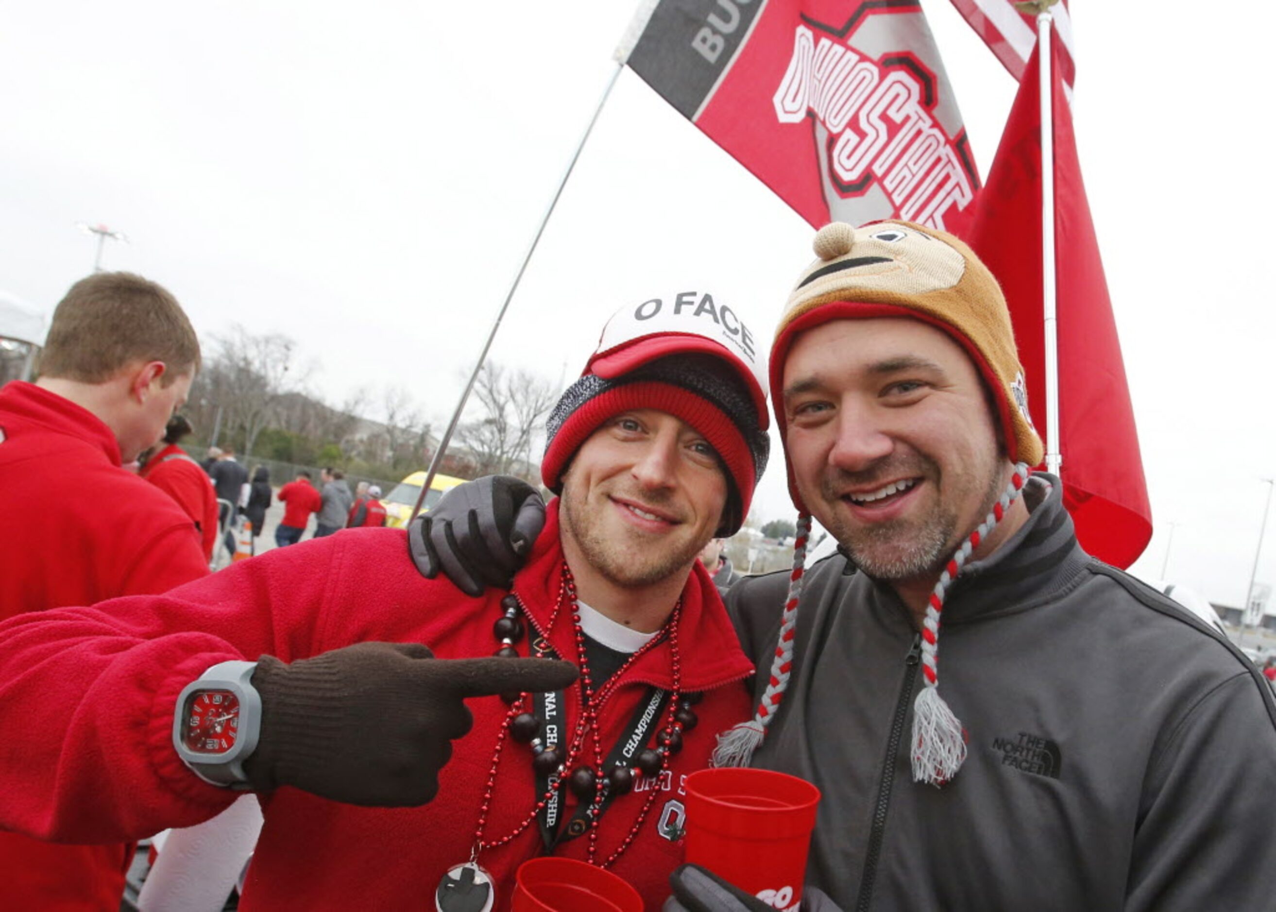 Adam Lester and Rob Headley enjoy some refreshments as they tailgate before the College...