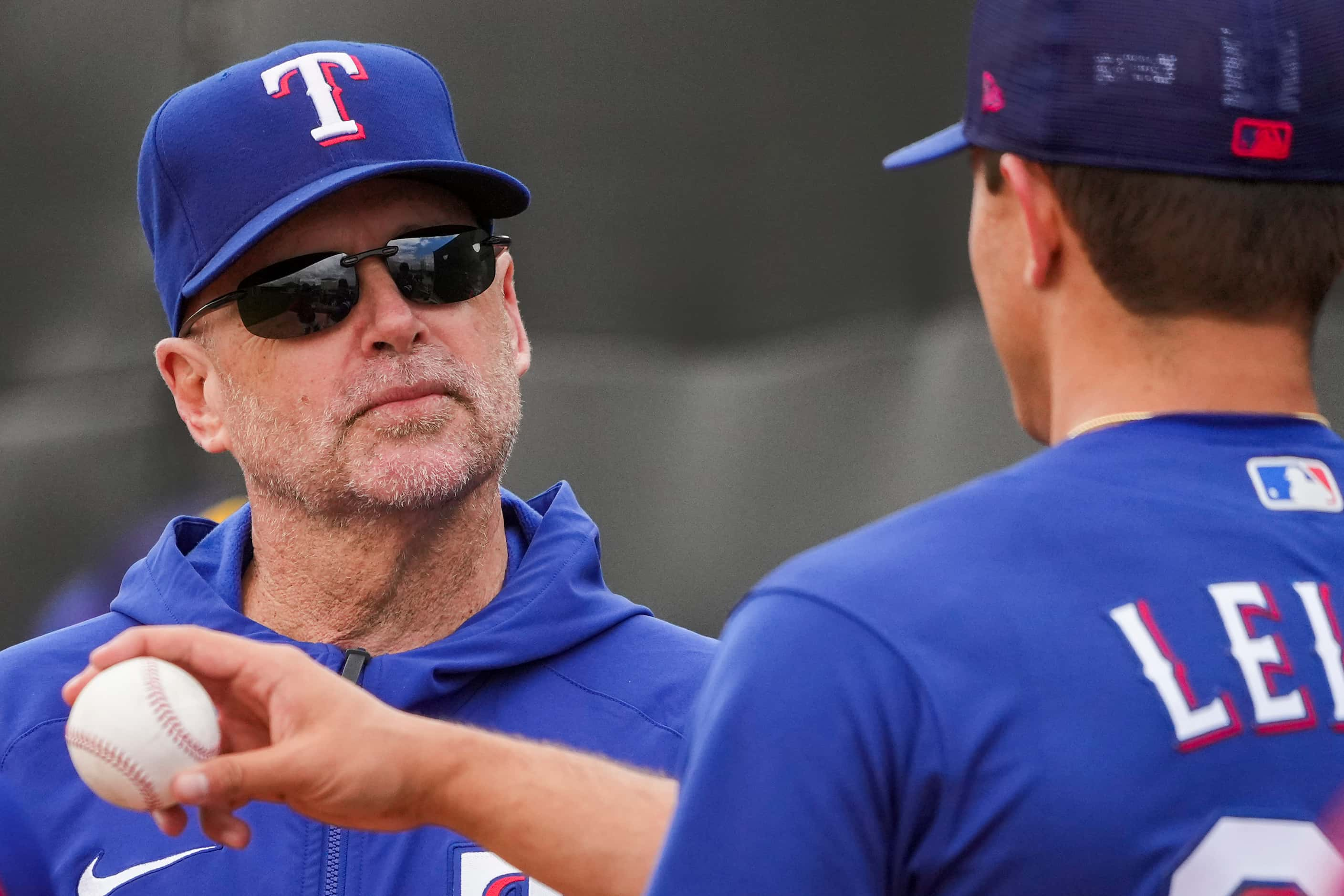 Texas Rangers pitcher Jack Leiter talks with AA Frisco Roughriders pitching coach Jeff...