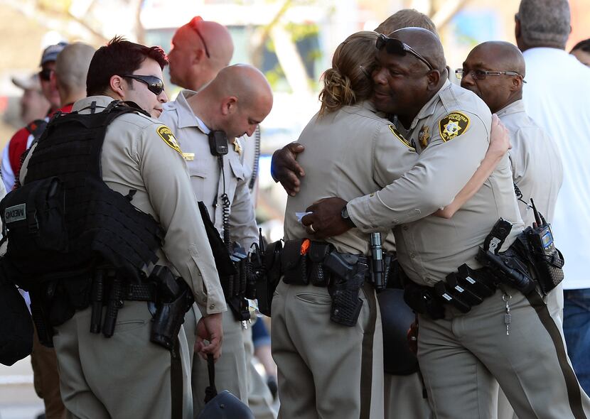LAS VEGAS, NV - JUNE 08:  Las Vegas Metropolitan Police Department officers hug near a...