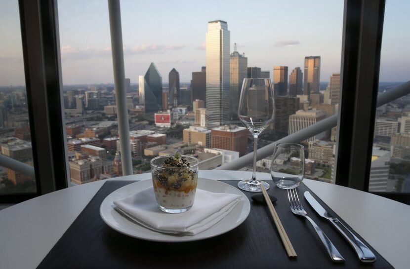 A desert of halo halo with a Dallas skyline in the background at Five Sixty by Wolfgang Puck...