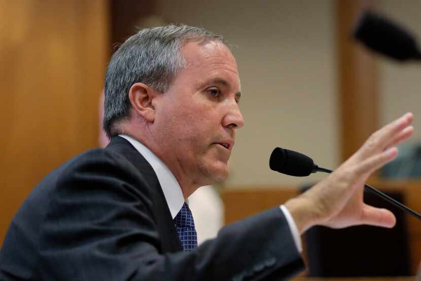 Texas Attorney General Ken Paxton testifies during a Texas Senate Health and Human Services...