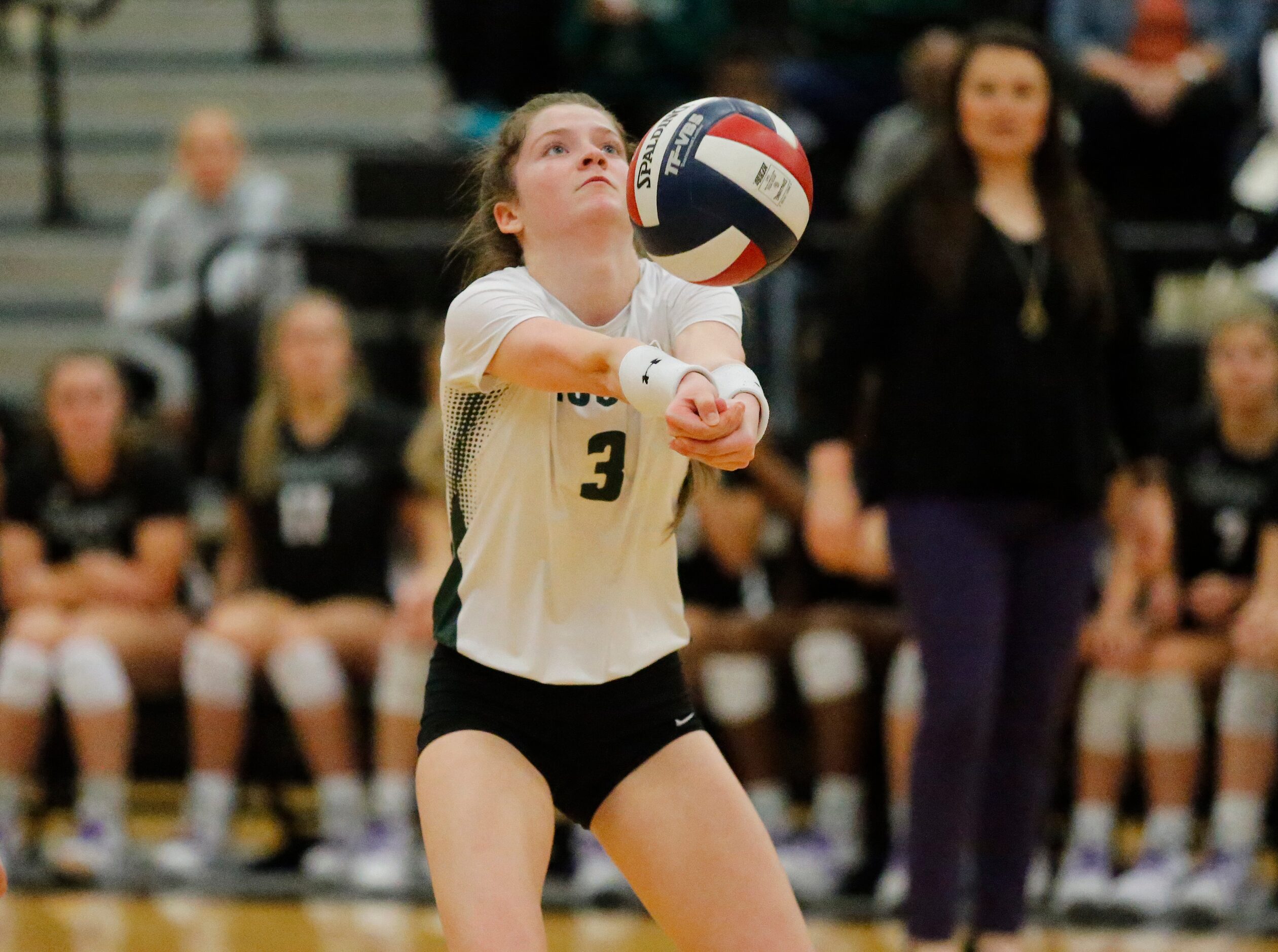 Prosper High School defensive specialist Brianna Martin (3) makes a pass during game three...