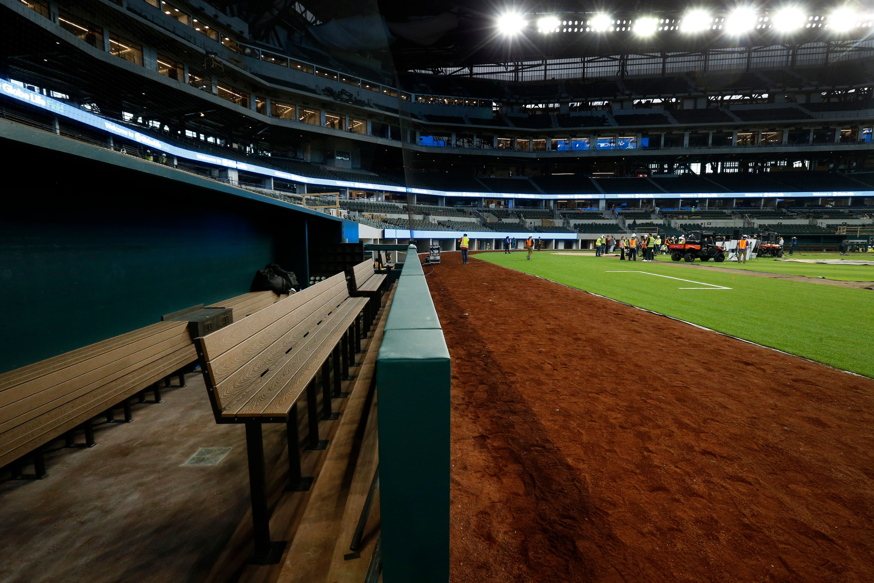 The Texas Rangers dugout is nearing completion inside the new Globe Life Field under...