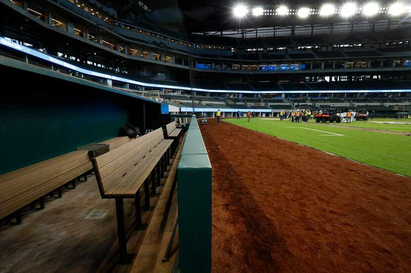 The Texas Rangers dugout is nearing completion inside the new Globe Life Field under...