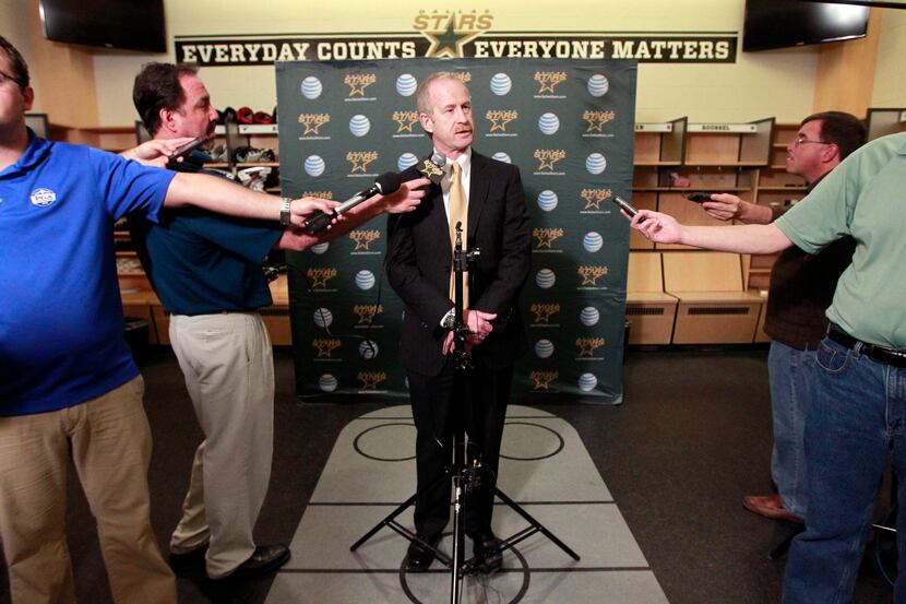 Jim Nill (center), general manager for the Dallas Stars, talks with the media Tuesday, May...