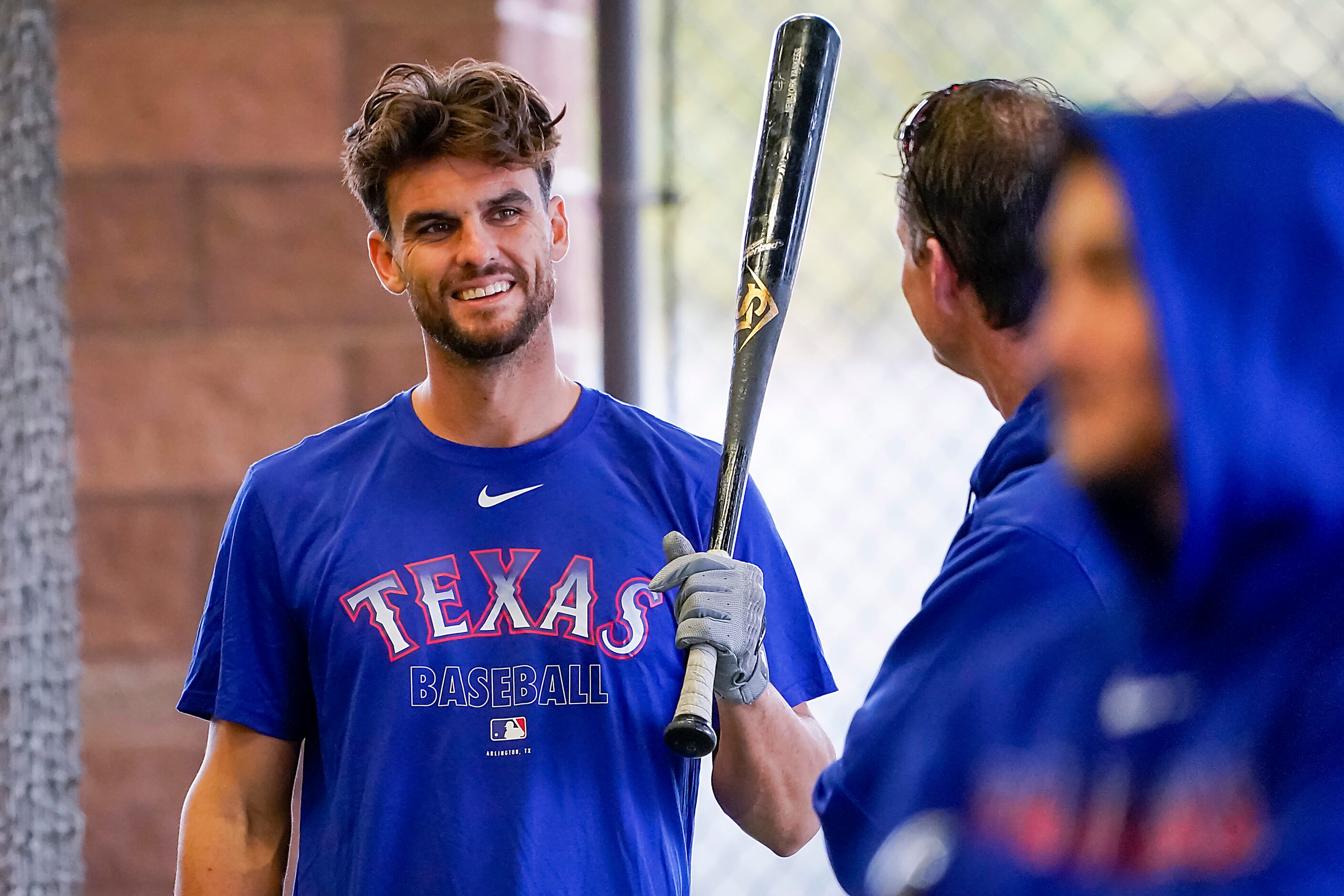 Texas Rangers infielder Greg Bird waits to hit in the batting cage on the day pitchers and...