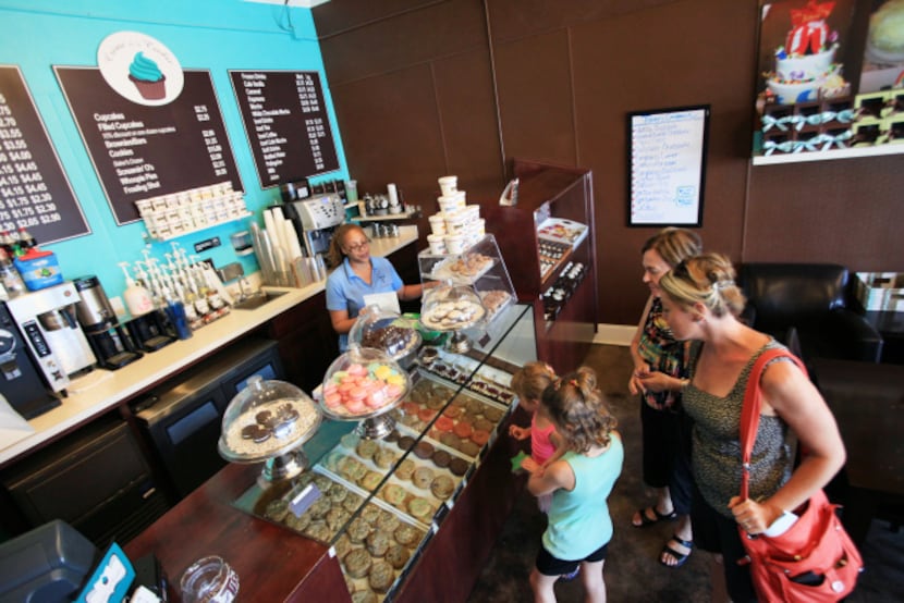 The McCormick family checked out the treats recently at Crème de la Cookie at Snider Plaza...