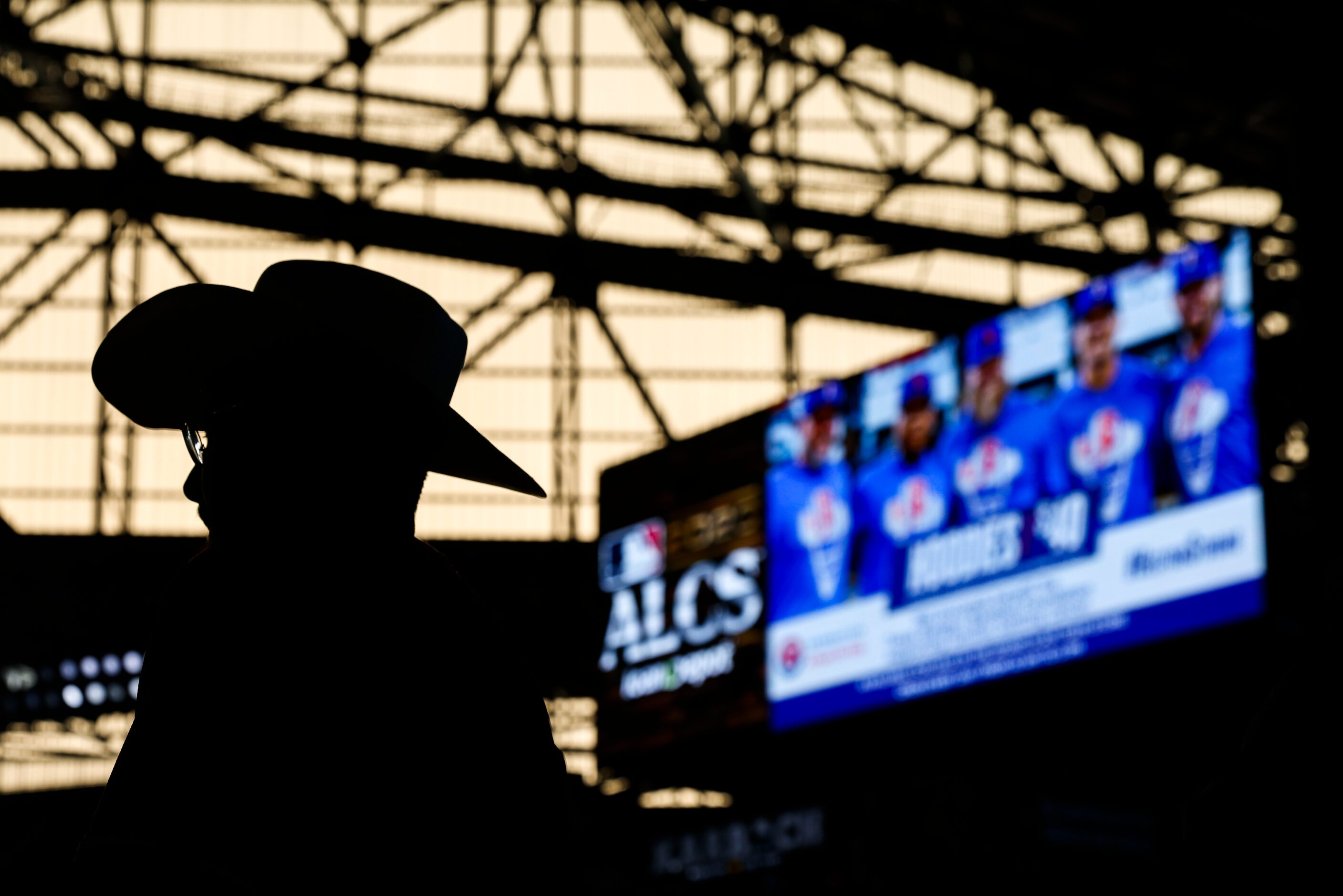 Fans walk around Globe Life Field ahead of Game 4 of the American League Championship Series...