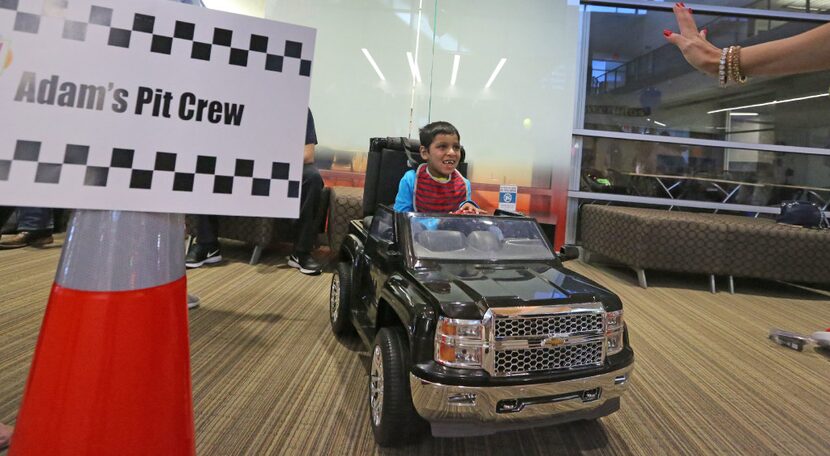 Adam Ahmed, 6, new truck accommodates his long legs.  The first-grader had two other...