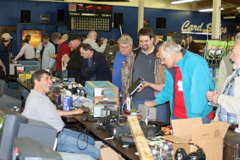 
Radio operators browse booths at Hamfest, the Irving Amateur Radio Club’s annual ham radio...