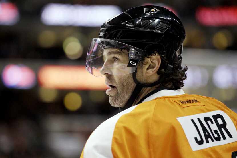 In this March 8, 2012, file photo, Philadelphia Flyers' Jaromir Jagr looks across the ice...