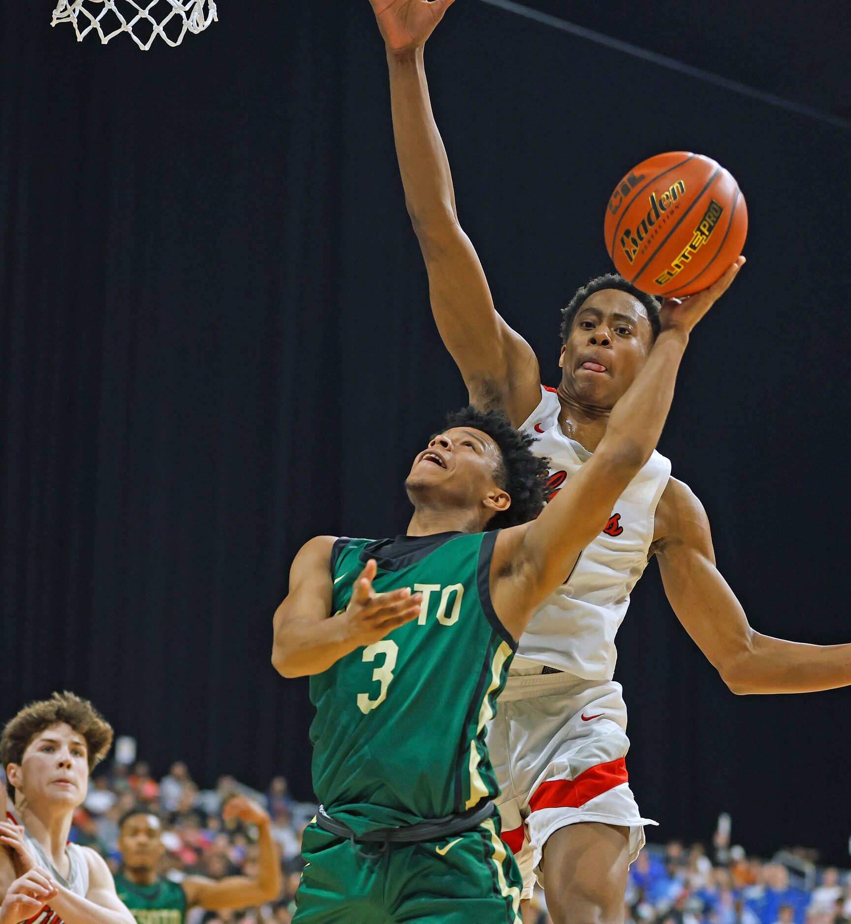 Richardson Lake Highlands Tre Johnson (20) blocks shot of DeSoto Valrick Halliburton (3) in...