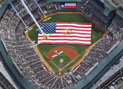 Vintage aircraft flyover at Globe Life Park on opening day of 2014.