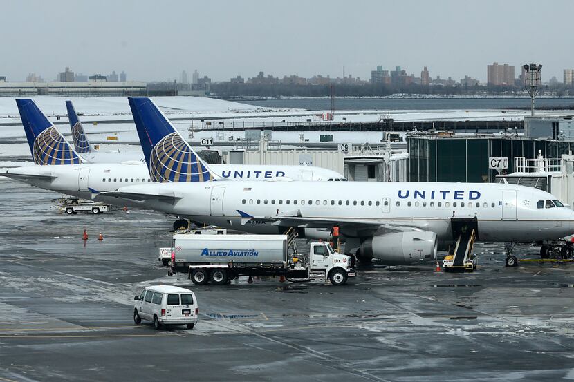 FILE - In this Wednesday, March 15, 2017, file photo, United Airlines jets sit on the tarmac...