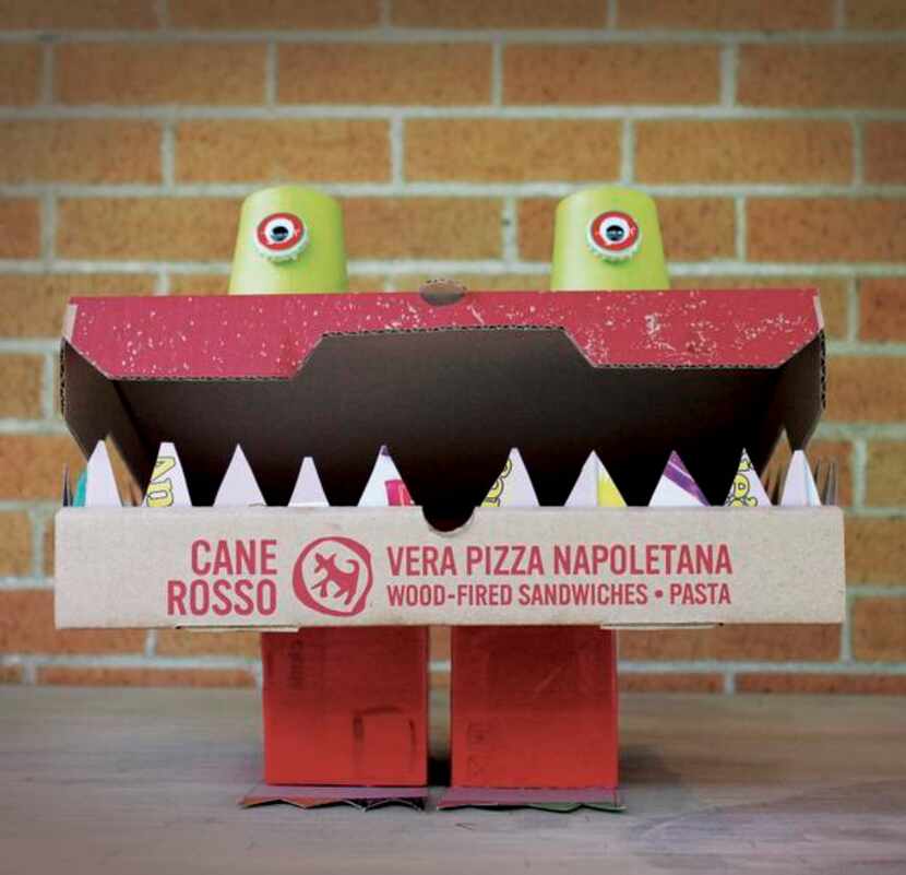 
MONSTER: My little one wanted to make a monster, and a pizza box seemed perfect. He drew...