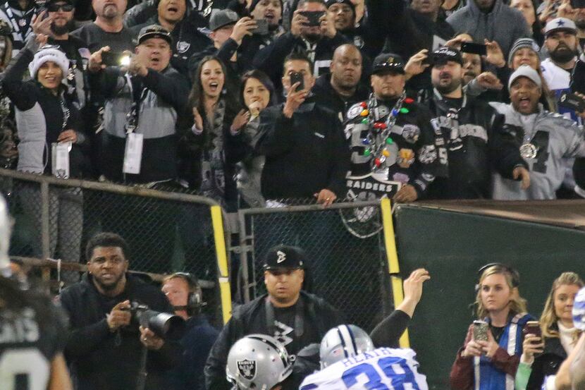 Oakland Raiders quarterback Derek Carr (4) reaches out for the goal line but fumbles the...