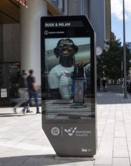 A city of Dallas presentation shows a digital kiosk obstructing a Houston sidewalk.