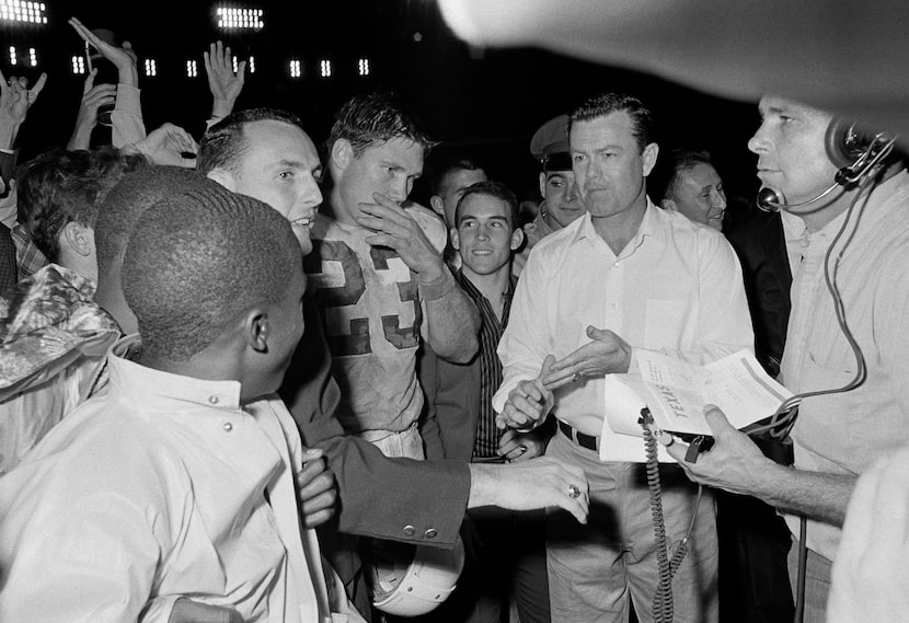 Texas coach Darrell Royal, right, with his top scoring back at his side, Ernie Koy (23),...