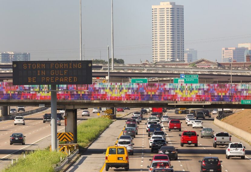 A traffic sign reminds motorists to prepare for Hurricane Harvey on Thursday in Houston. The...