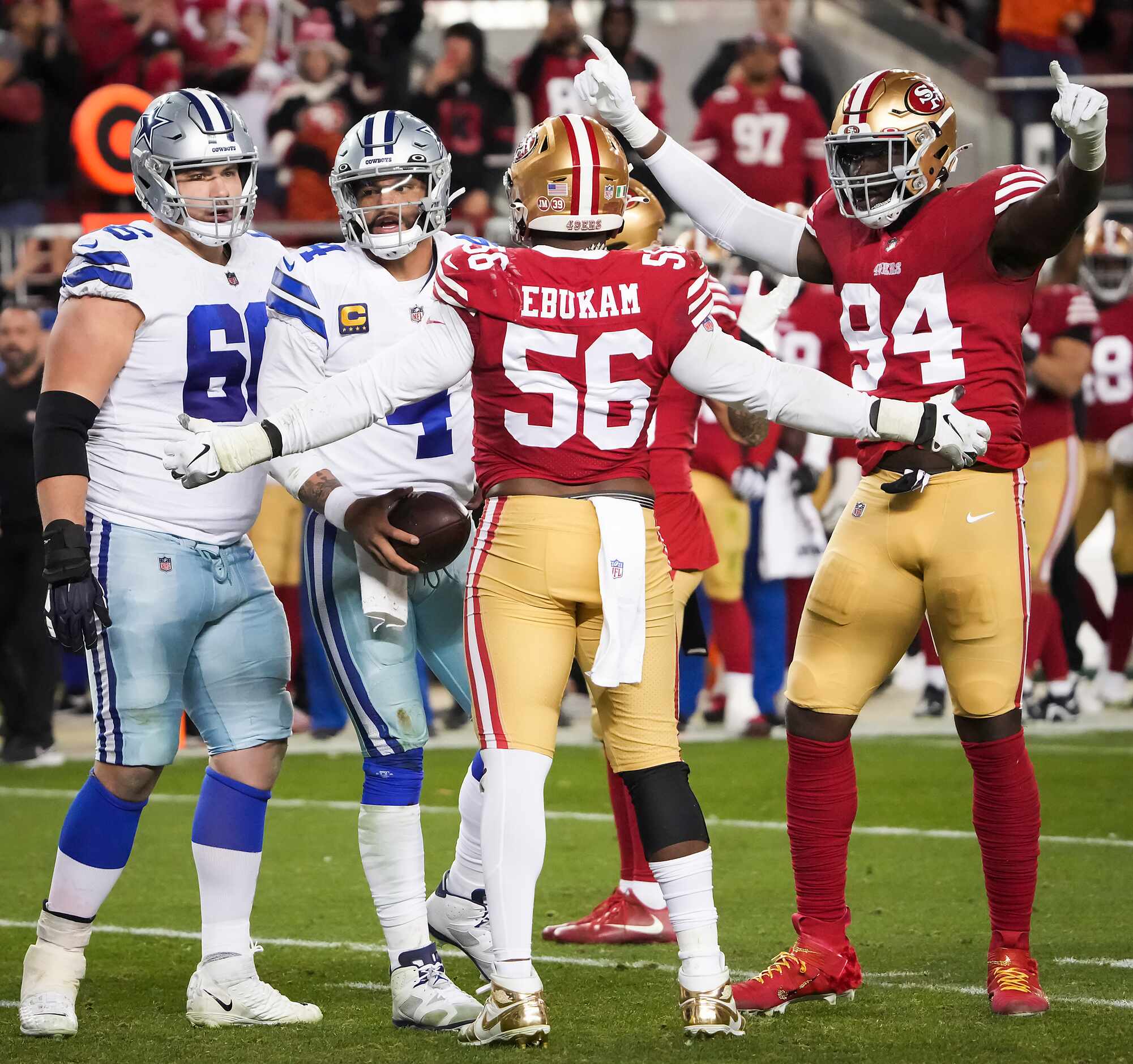 Dallas Cowboys quarterback Dak Prescott (4) gets up from the ground as San Francisco 49ers...