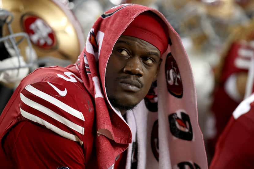 San Francisco 49ers linebacker Randy Gregory (5) sits on the sideline during an NFL...