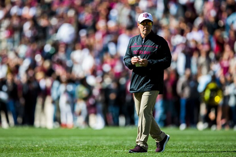 FILE - Texas A&M Aggies head coach Jimbo Fisher stands on the field during a Texas A&M...