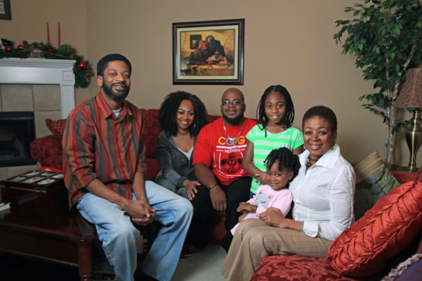 Jennifer Cox (holding granddaughter Tiffani Wallace) celebrated Christmas with her sons...
