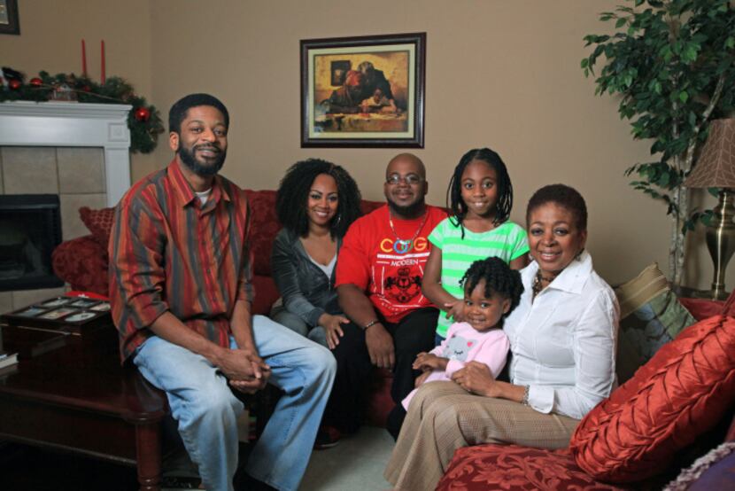 Jennifer Cox (holding granddaughter Tiffani Wallace) celebrated Christmas with her sons...