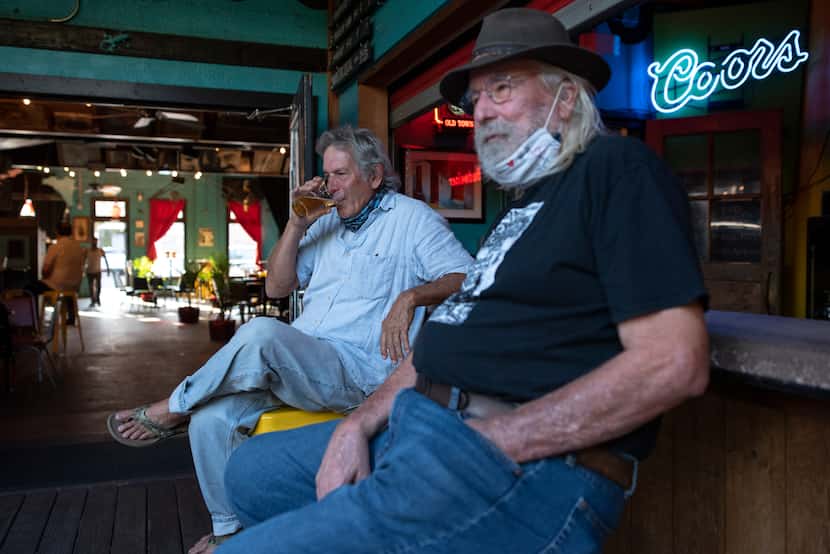 Dan's Silverleaf co-owner Dan Mojica (left) had a beer with John Snow on the bar's patio.