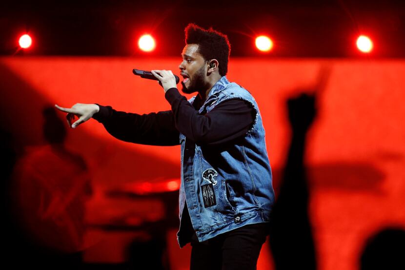 The Weeknd performs at the American Airlines Center in Dallas on Thursday, May 4, 2017....