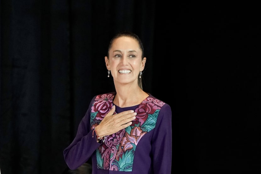 Ruling party presidential candidate Claudia Sheinbaum greets supporters after the National...