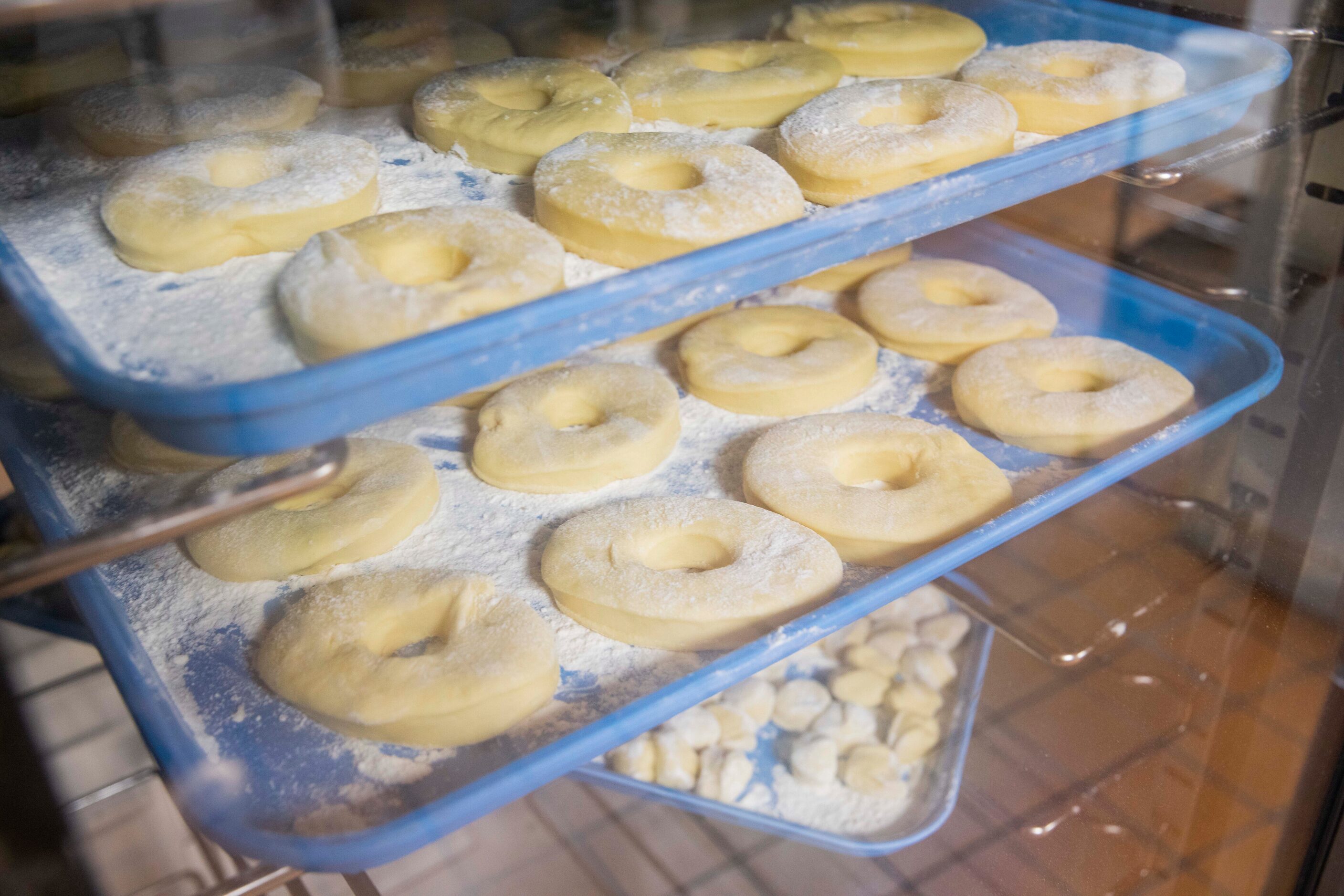 Yeast bread is left to proof on Tuesday, Feb. 7, 2023, in Dallas. Lone Star Donuts has been...