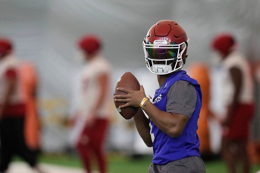 Oklahoma quarterback Kyler Murray in action during an NCAA college football practice on...