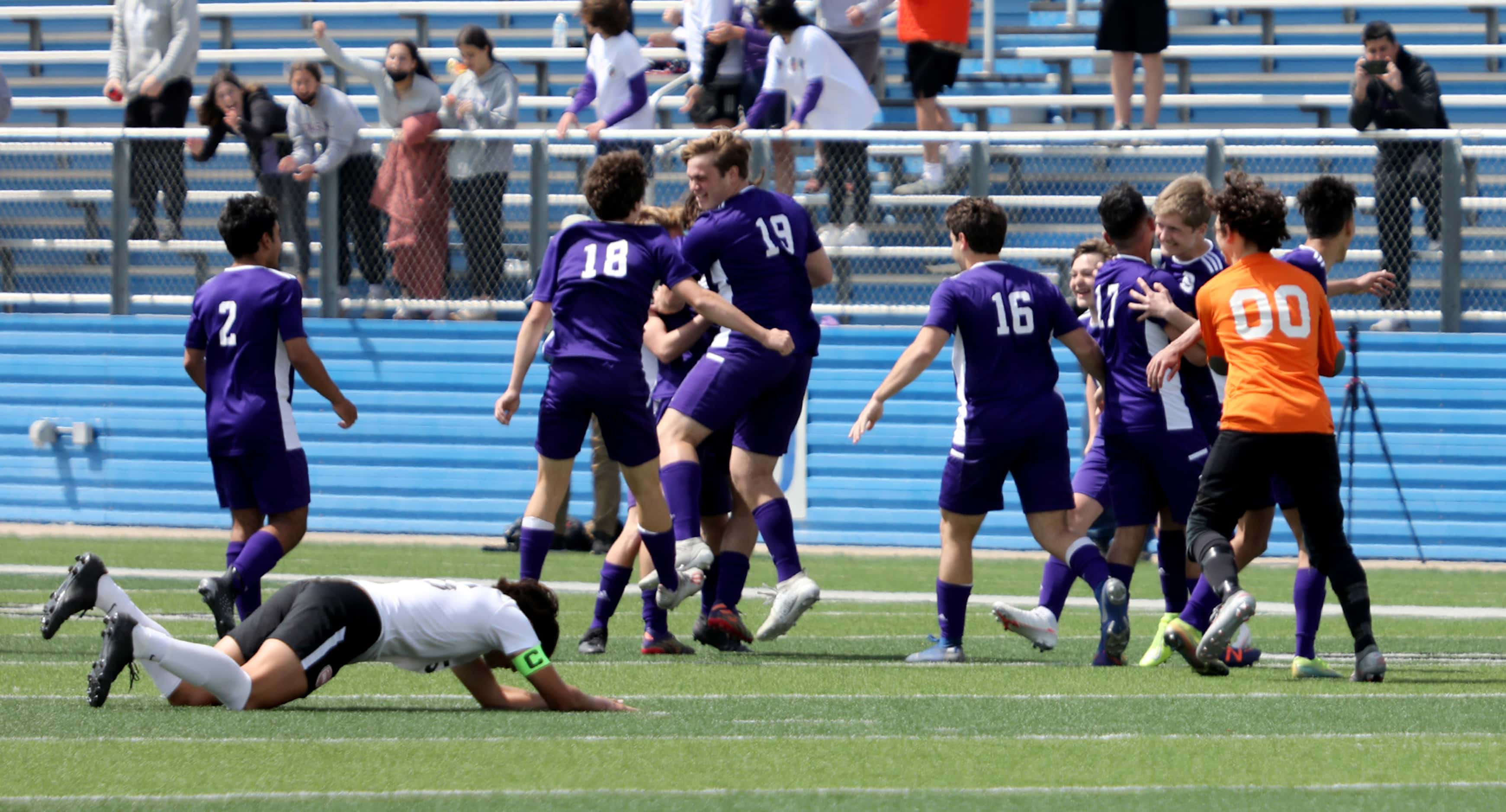 Boerne players celebrate after their UIL 4A boys State championship soccer game against Fort...