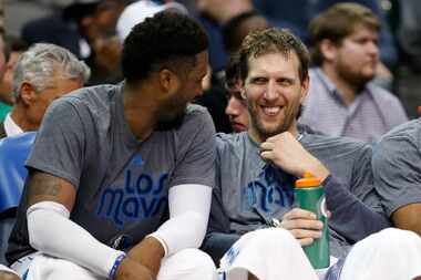 Dallas Mavericks guard Wesley Matthews (23) and Dallas Mavericks forward Dirk Nowitzki (41)...