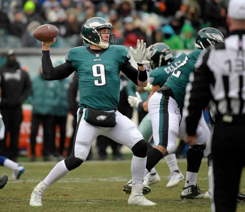 Philadelphia Eagles quarterback Nick Foles (9) looks for an open reciever during the first...