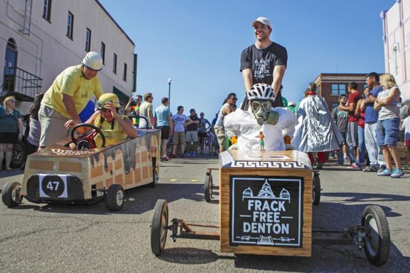 
Frack Free Denton  member Jeff McClung wore a gas mask to drive home the group’s point as...