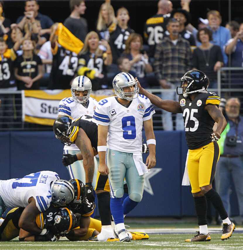 Pittsburgh Steelers free safety Ryan Clark (25) slaps Dallas Cowboys quarterback Tony Romo...