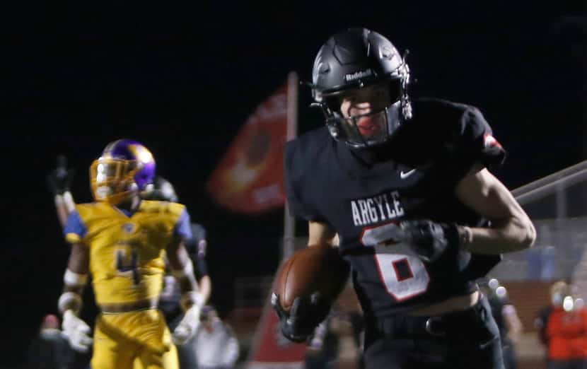 Argyle receiver Hayden Stewart (6) rambles into the end zone for a first quarter receiving...