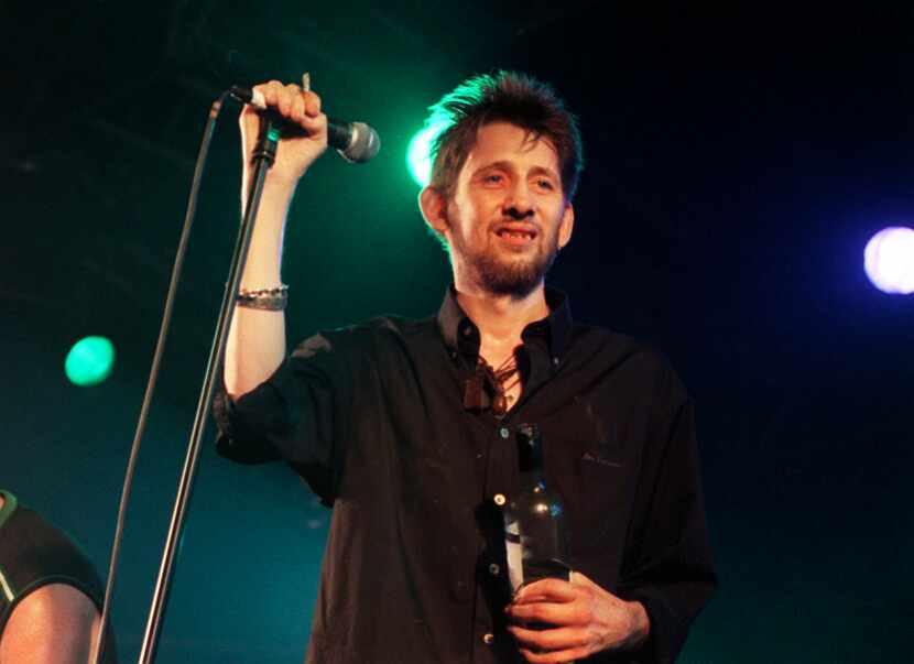 FILE - Former Pogues member Shane MacGowan performs on stage with his group The Popes, at...