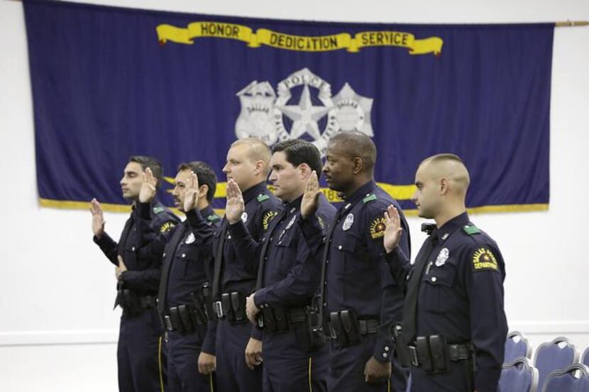 
Six Dallas Police Reserve officers in Reserve Class 52 took the oath at a graduation...