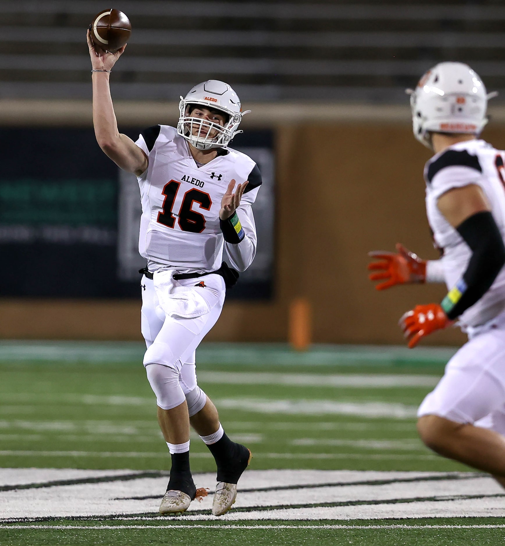 Aledo quarterback Brayden Fowler-Nicolosi (16) looks to make a pass to tight end Jason...