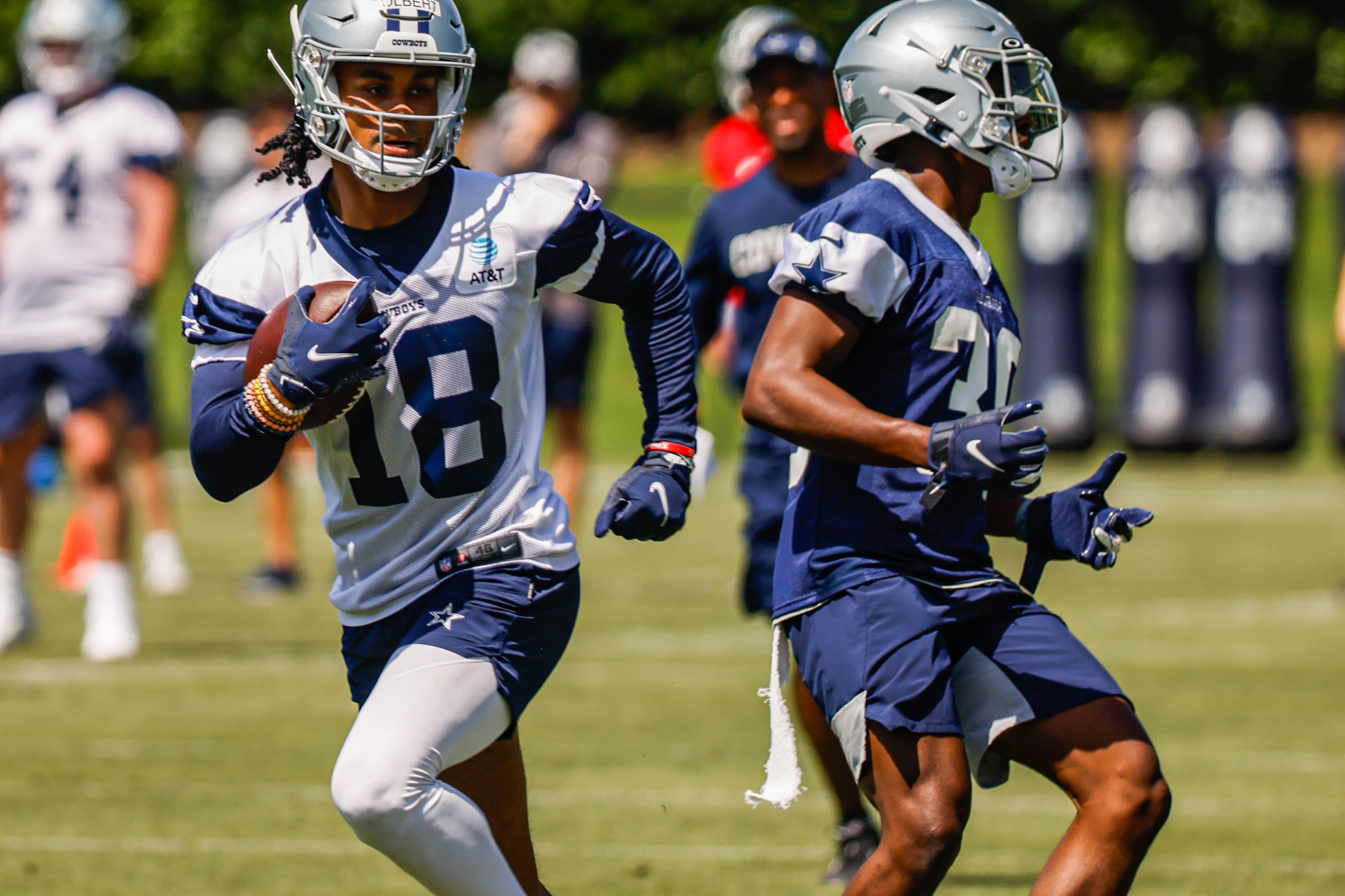 Dallas Cowboys cornerback (30) DaRon Bland and wide receiver (18) Jalen Tolbert during a...