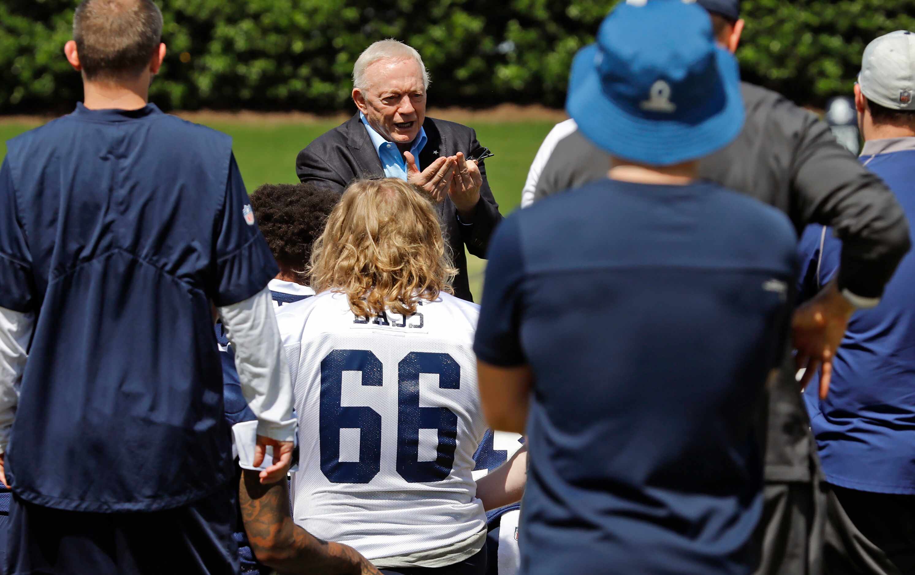 Dallas Cowboys owner Jerry Jones speaks to the team before the start of drills as the Dallas...