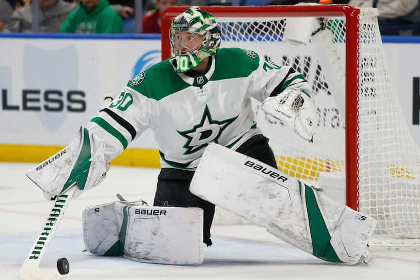 Dallas Stars goalie Ben Bishop makes a save during the third period of the team's NHL hockey...
