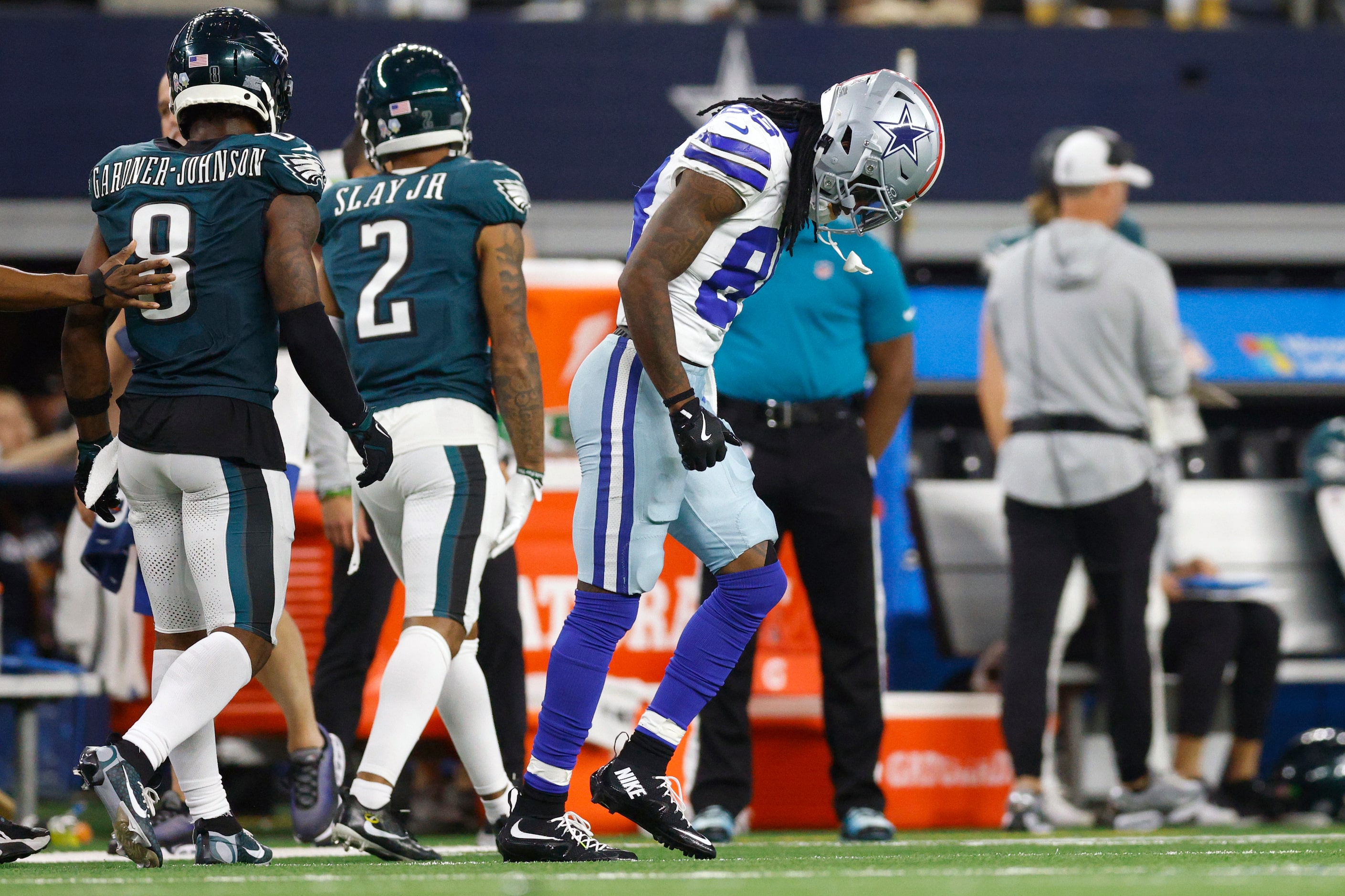 Dallas Cowboys wide receiver CeeDee Lamb (88) drops his head after failing to make a catch...