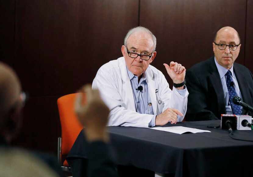 
Dr. Edward Goodman (left), epidemiologist at Texas Health Presbyterian Hospital, and Dr....