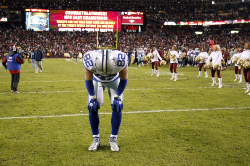 Dallas Cowboys tight end Jason Witten (82) pauses before exiting the field after losing to...