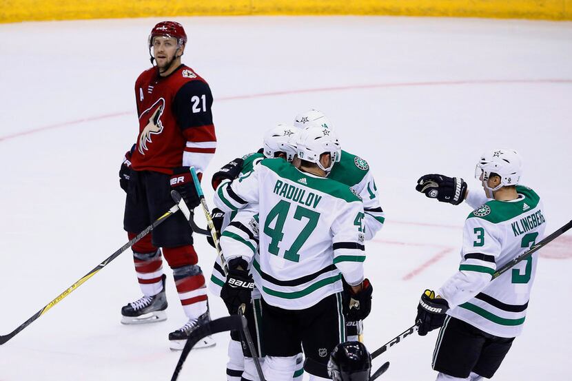 Dallas Stars center Tyler Seguin, second from left, celebrates his goal with Stars left wing...